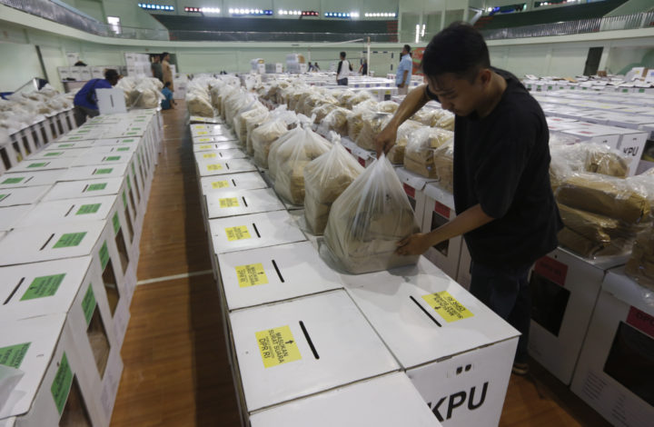 epa07507546 A district employee prepares ballot boxes a day before distributing to pollings center in Bogor, Indonesia, 15 April 2019. Indonesia will hold its general elections on 17 April, during which the president, vice president, and members of the People's Consultative Assembly will be elected.  EPA/ADI WEDA