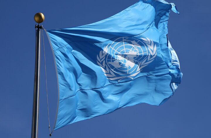 epa04947501 The United Nations flag flies outside United Nations Headquarters in New York City, New York, USA, 24 September 2015. Pope Francis will address the UN General Assembly 25 September and the UN Development Summit and General Assembly will take place from 25 September through 03 October with more than 150 heads of state in attendance.  EPA/MATT CAMPBELL
