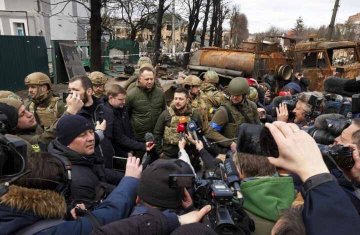epa09870356 A handout photo made available by the Ukrainian Presidential Press Service shows Ukrainian President Volodymyr Zelensky (C) speaking with journalists in the recaptured by the Ukrainian army Bucha city of Kyiv (Kiev) area, Ukraine, 04 April 2022. On 24 February, Russian troops had entered Ukrainian territory in what the Russian president declared a 'special military operation', resulting in fighting and destruction in the country, a huge flow of refugees, and multiple sanctions against Russia.  EPA/UKRAINIAN PRESIDENTIAL PRESS SERVICE HANDOUT  HANDOUT EDITORIAL USE ONLY/NO SALES