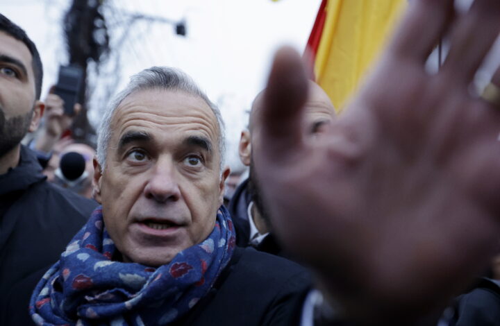 epa11764109 Calin Georgescu, Romania's independent candidate who won the first round of the presidential elections, makes his way for a statement outside the Secondary School No. 1 polling station, where he was scheduled to cast his vote in the second round of the presidential elections in Mogosoaia, near Bucharest, Romania, 08 December 2024. The Romanian Constitutional Court (CCR) annulled the first round of presidential elections on 06 December. The Romanian Constitutional Court (CCR) annulled the first round of presidential elections on 06 December. According to the CCR, the government will set a new election date, and the entire electoral process will be re-run, beginning with candidate registration and validation.  EPA/ROBERT GHEMENT