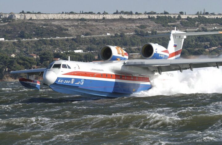 epa00846936 (FILES) Picture dated 24 October 2003 shows a Russian Beriev 200 (BE-200) firefighting plane, built by Irkut compagny, picking up water during the second Euro-Mediterranean meeting against wildfires at Marseille-Provence airport, France. Indonesia has leased two Russian firefighting aircraft to tackle hundreds of man-made forest fires that have sent choking haze across parts of South-East Asia, a local report said Monday, 23 October 2006. The amphibious BE-200 aircraft can hold up to 11 metric tons of water collected from a lake or the ocean - three times as much as any Indonesian plane - and then drop the payload onto the fires, The Jakarta Post reported. EPA/ERIC TSCHEN FRANCE OUT